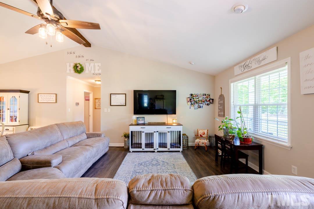 9622 Sawyer Road Rougemont, NC 27572 - Photo 6 of 34 a living room with furniture and a flat screen tv