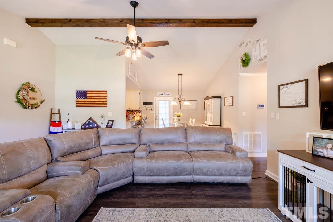 9622 Sawyer Road Rougemont, NC 27572 - Photo 9 of 34 a living room with furniture and a fireplace