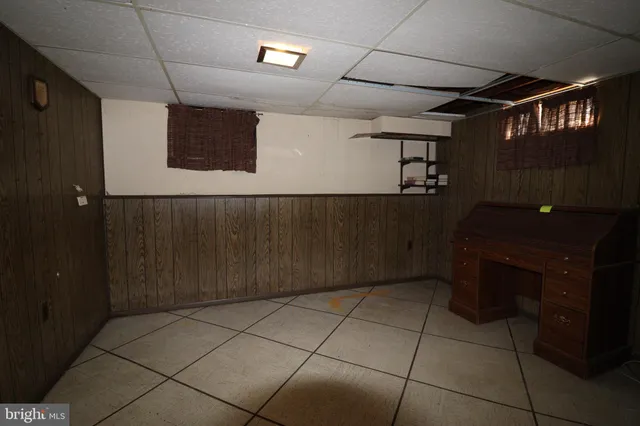 a kitchen with a wooden cabinets