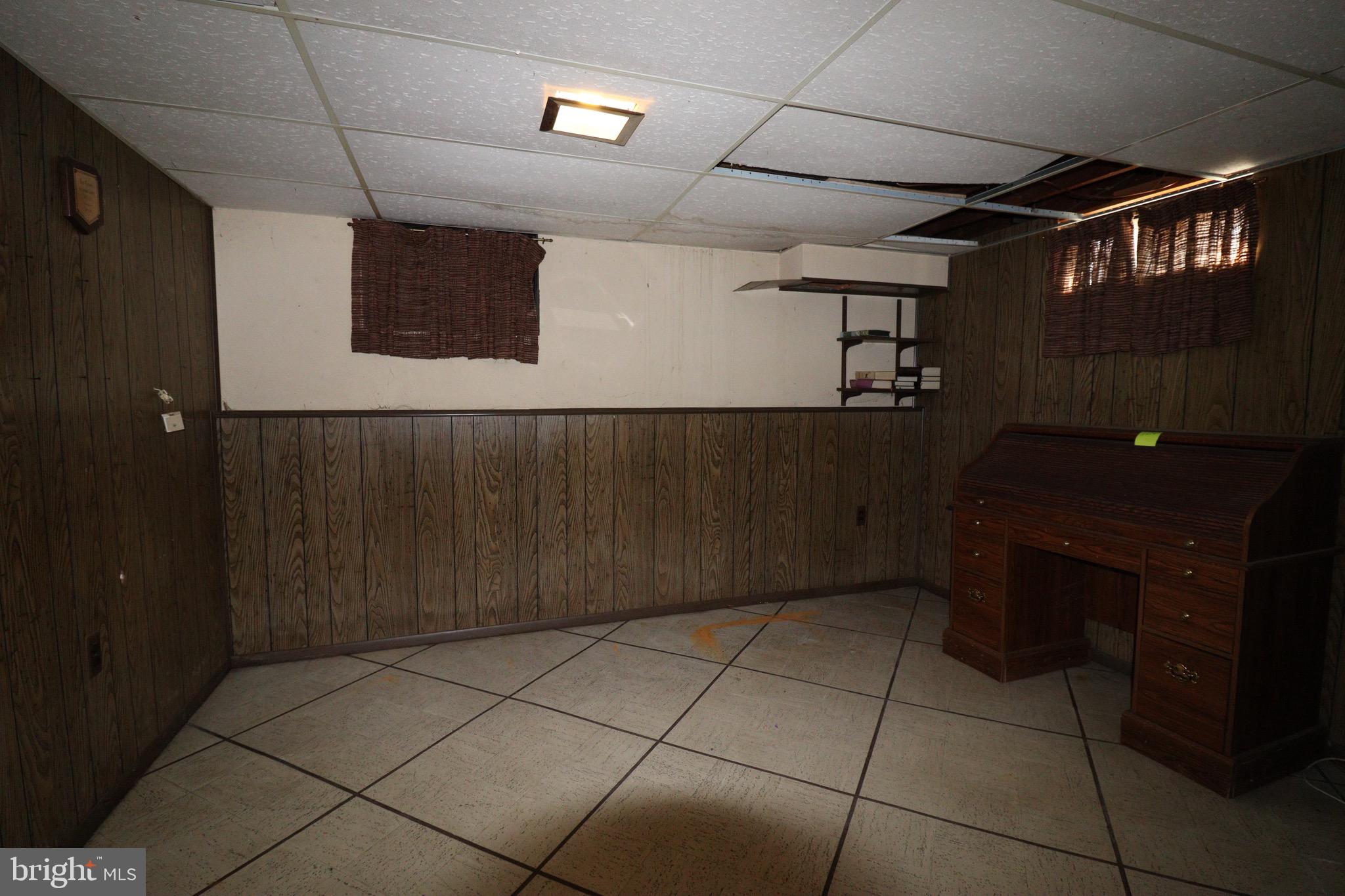 56 Sherbrooke Road Trenton, NJ 08638 - Photo 13 of 31 a kitchen with a wooden cabinets