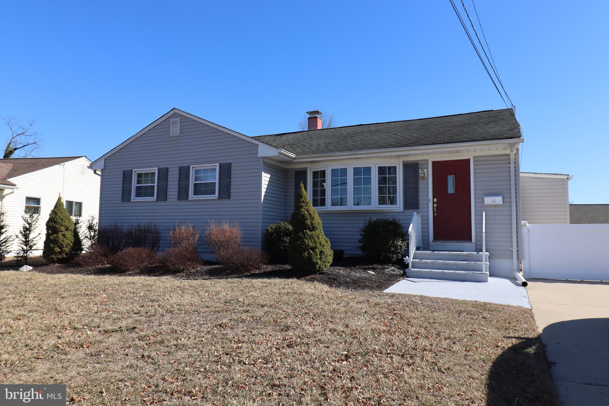 56 Sherbrooke Road Trenton, NJ 08638 - Photo 2 of 31 a front view of a house with a yard
