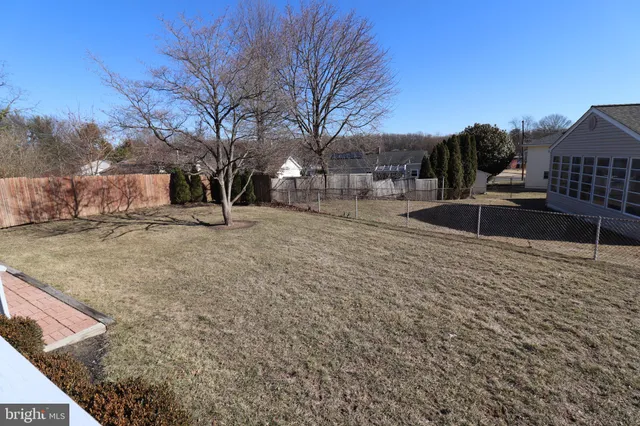 a view of a backyard with snow