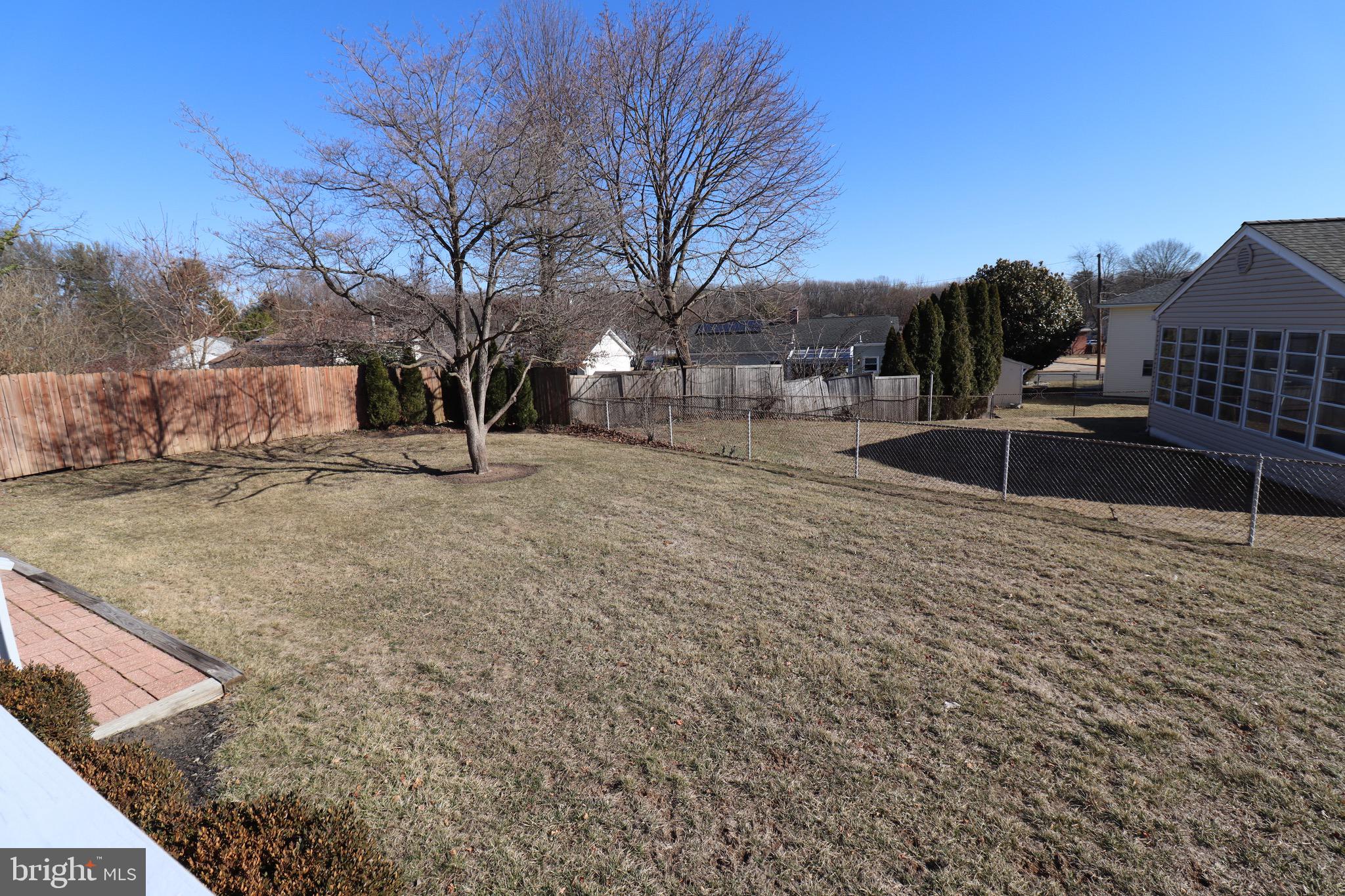 56 Sherbrooke Road Trenton, NJ 08638 - Photo 29 of 31 a view of a backyard with snow