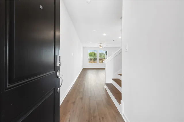 a view of hallway with stairs