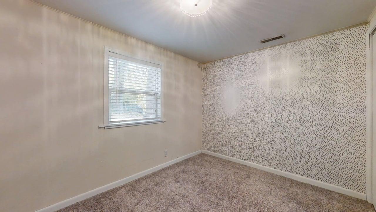 1410 South Mattis Avenue Champaign, IL 61821 - Photo 16 of 27 a room that has a window in it