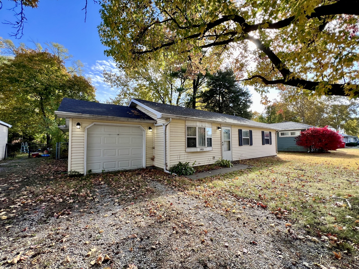 1410 South Mattis Avenue Champaign, IL 61821 - Photo 2 of 27 a view of a house with a yard