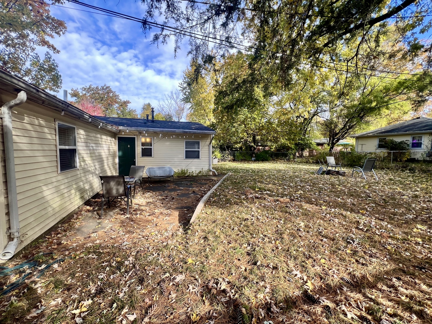 1410 South Mattis Avenue Champaign, IL 61821 - Photo 25 of 27 a view of a backyard with a tree