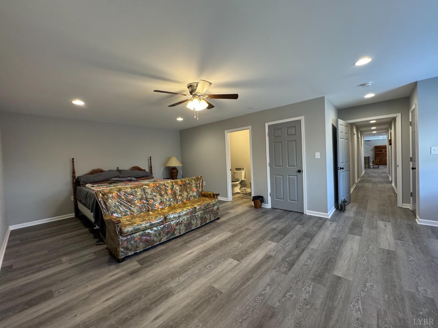 3941 Promise Land Road Appomattox, VA 24522 - Photo 14 of 21 a spacious bedroom with a bed and a table