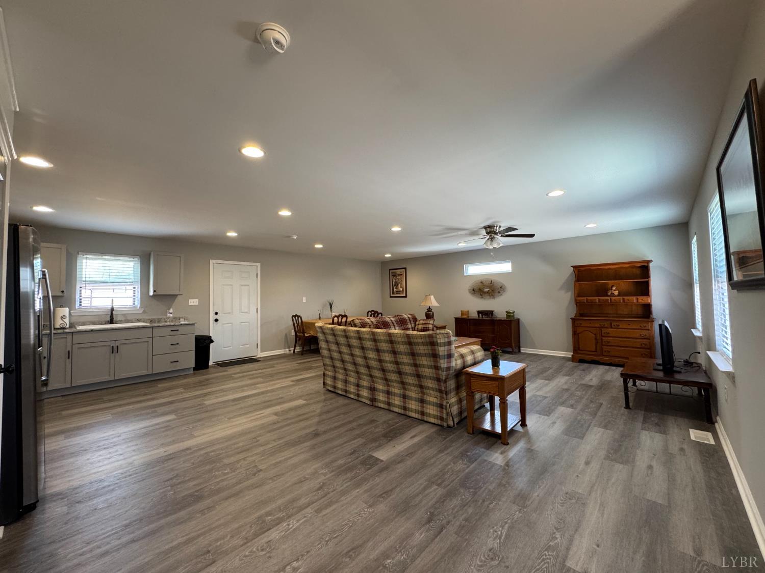 3941 Promise Land Road Appomattox, VA 24522 - Photo 5 of 21 a view of a kitchen with dining room wooden floor and furniture
