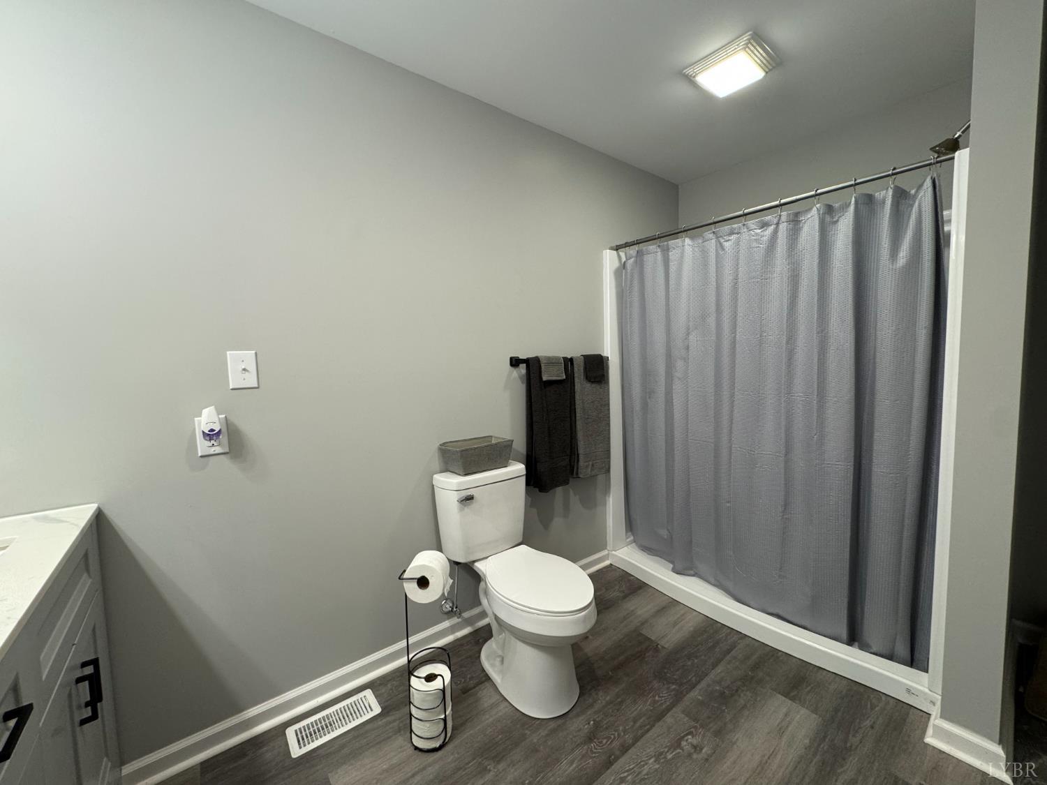 3941 Promise Land Road Appomattox, VA 24522 - Photo 10 of 21 a bathroom with a toilet and a shower