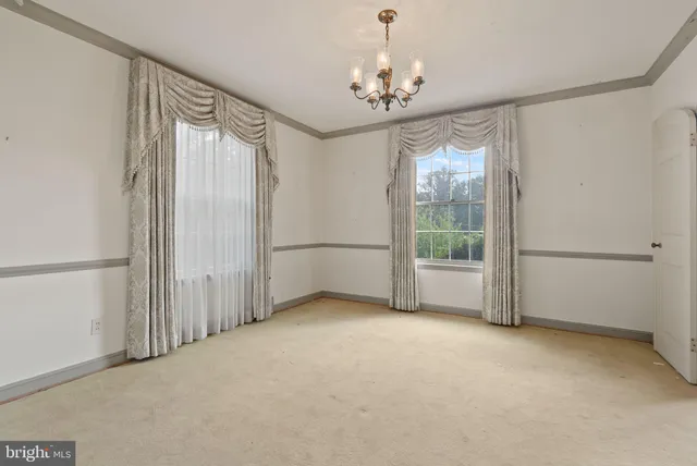 a kitchen with stainless steel appliances granite countertop a stove a refrigerator and a sink