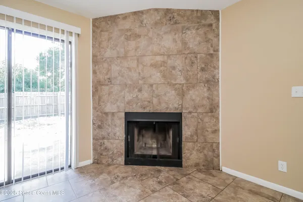 a living room with a fireplace