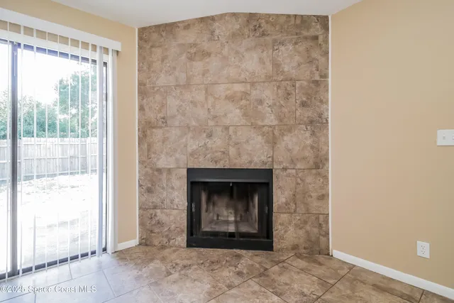 a living room with a fireplace