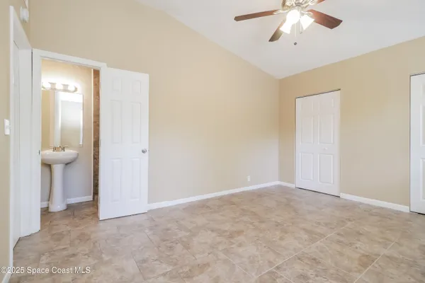 an empty room with fan