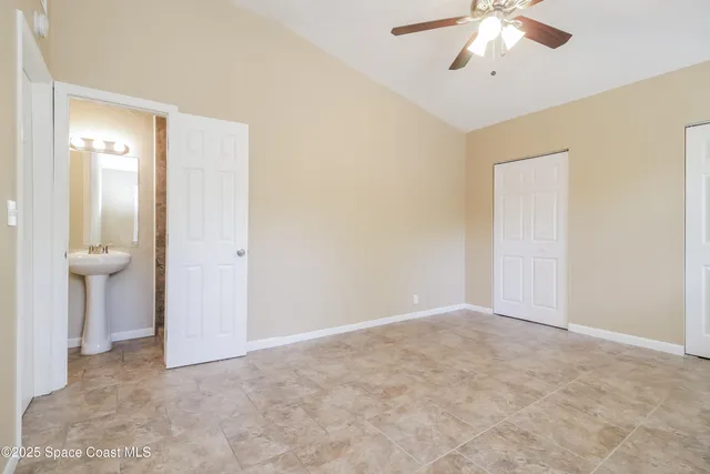 an empty room with fan