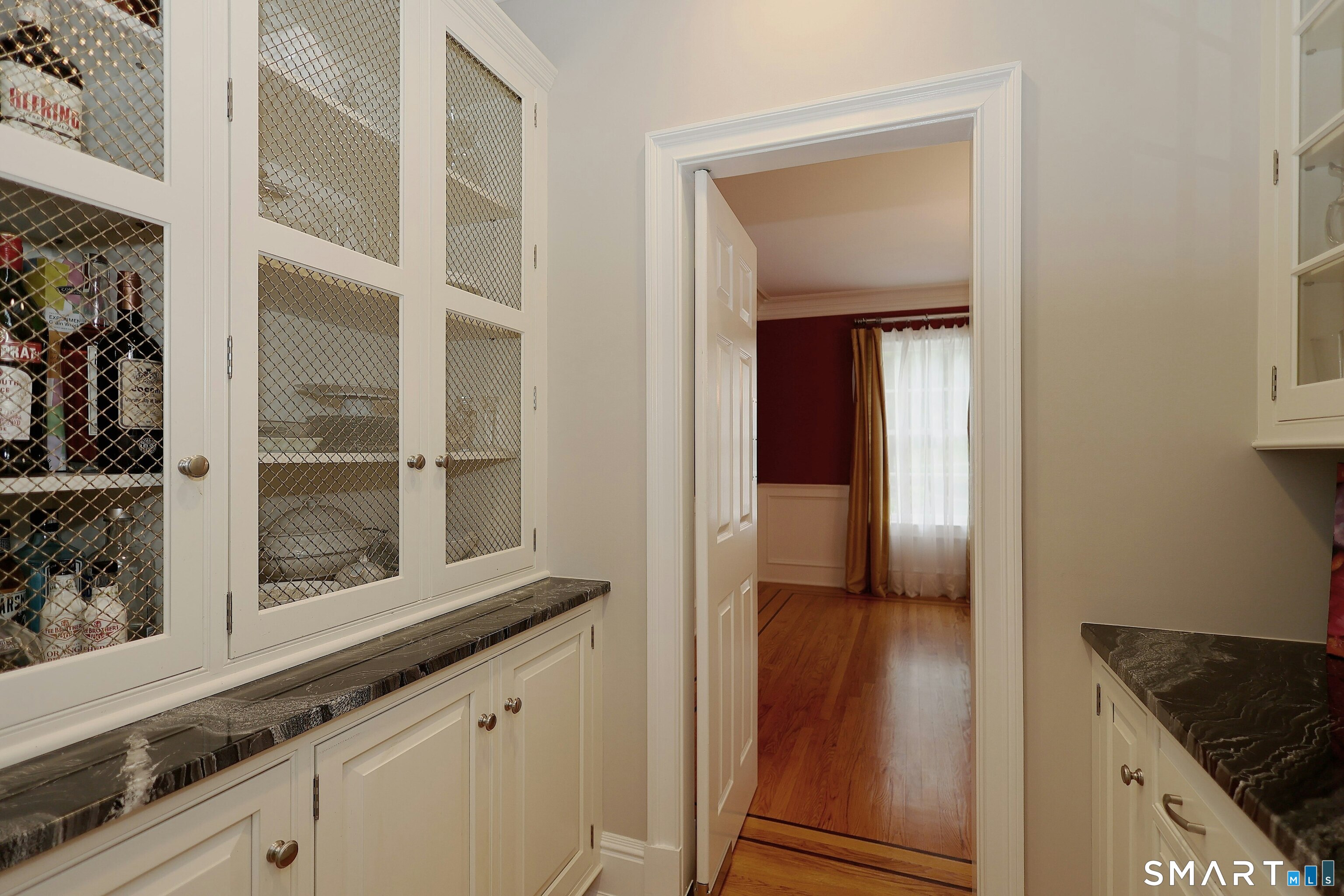30 Whipstick Road Ridgefield, CT 06877 - Photo 22 of 40 a view of a kitchen cabinets and a wooden floor