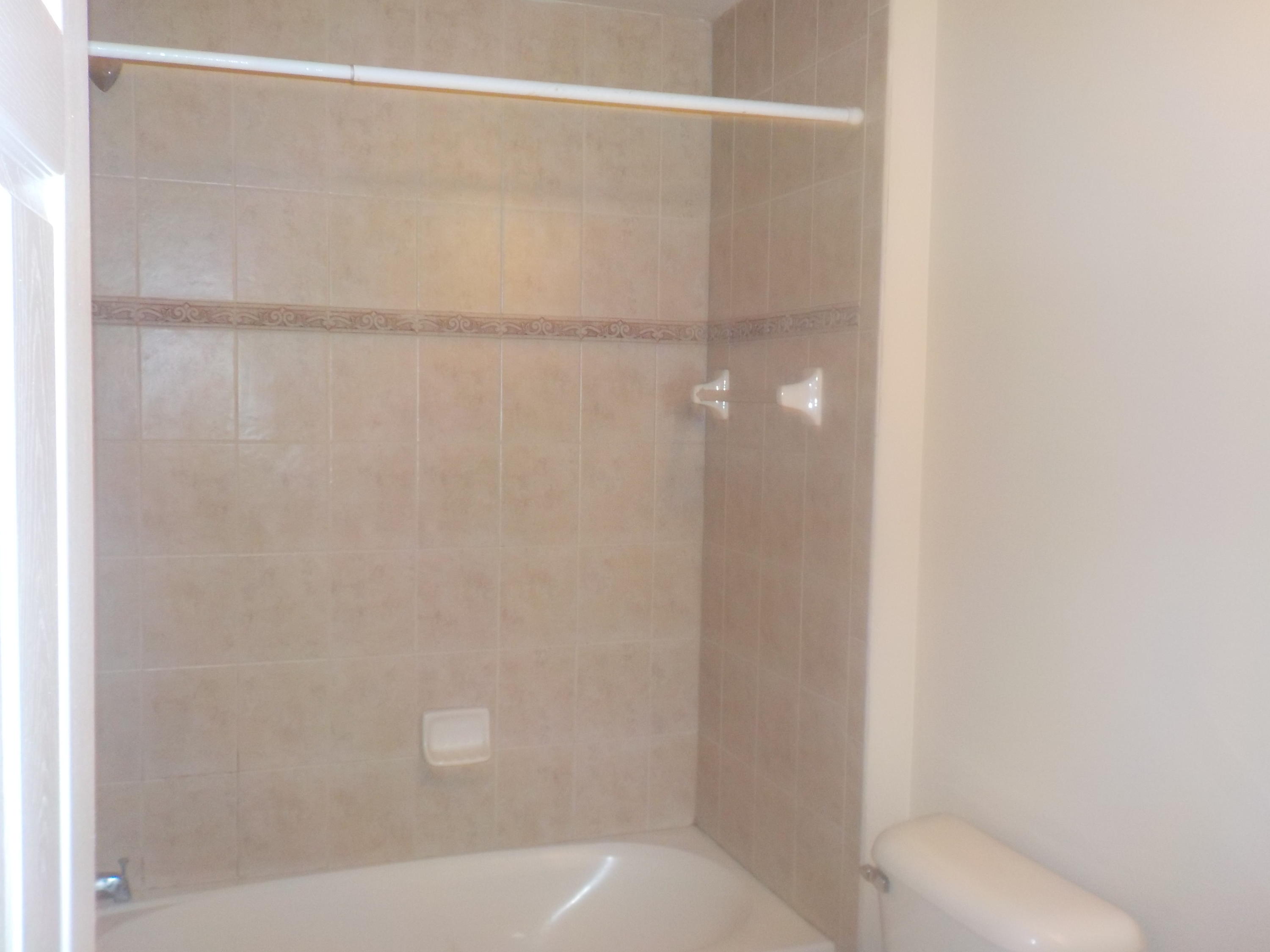 1957 Providence Place Port St. Lucie, FL 34953 - Photo 9 of 15 a bathroom with a shower