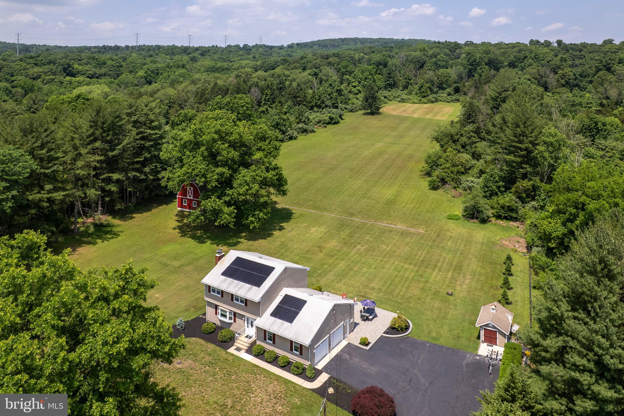 56 Valley Road Lambertville, NJ 08530 - Photo 2 of 49 an aerial view of a house with a yard
