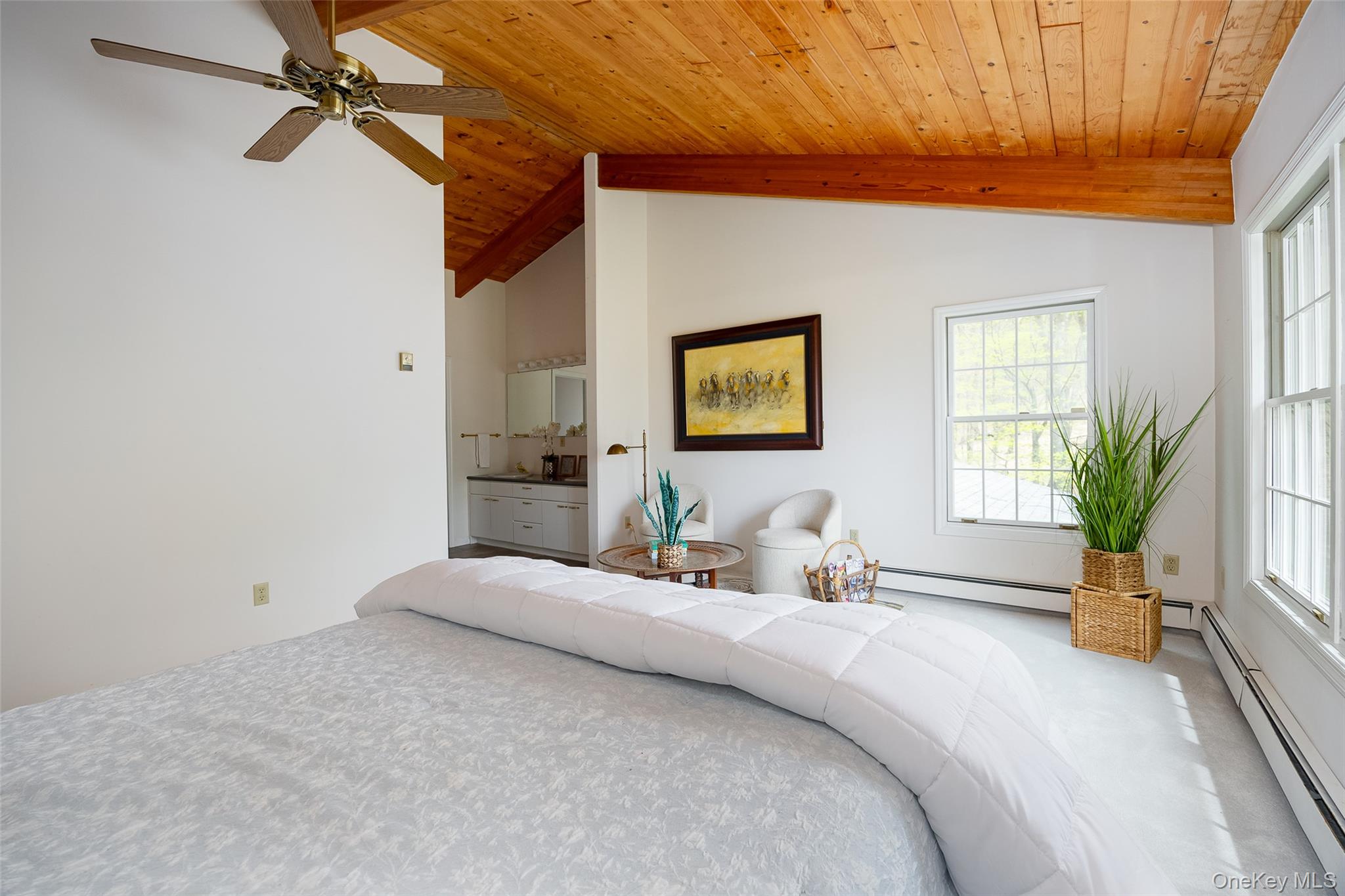 33 Willow Brook Ridge Clinton Corners, NY 12514 - Photo 33 of 50 a bedroom with a bed a couch and potted plant