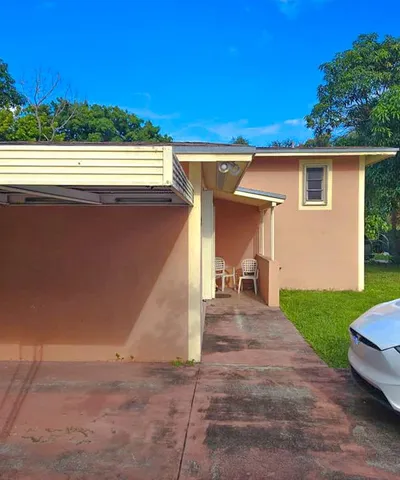 a view of a house with a patio