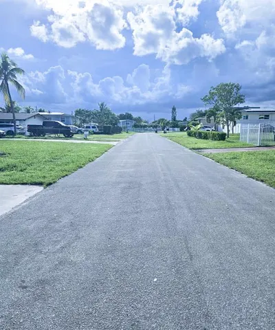 a view of a city street and a building