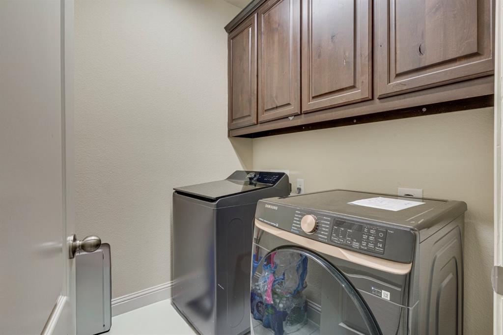336 Red Hill Road Sunnyvale, TX 75182 - Photo 16 of 36 a utility room with dryer and washer
