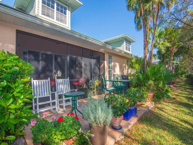 a view of a table and chairs in patio