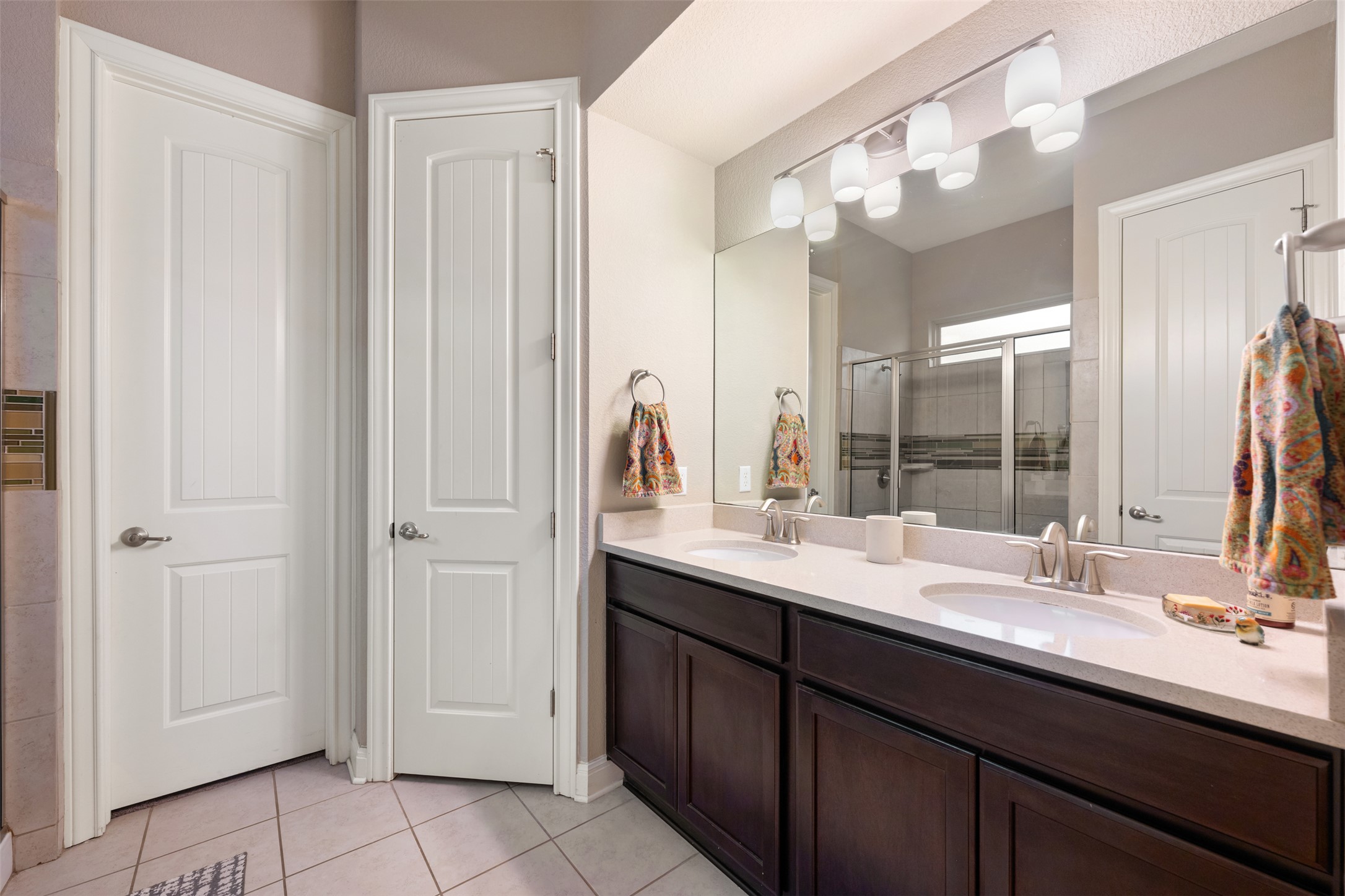 2505 Hopsack Mills Road Austin, TX 78748 - Photo 19 of 40 Primary bathroom has dual vanity sinks.