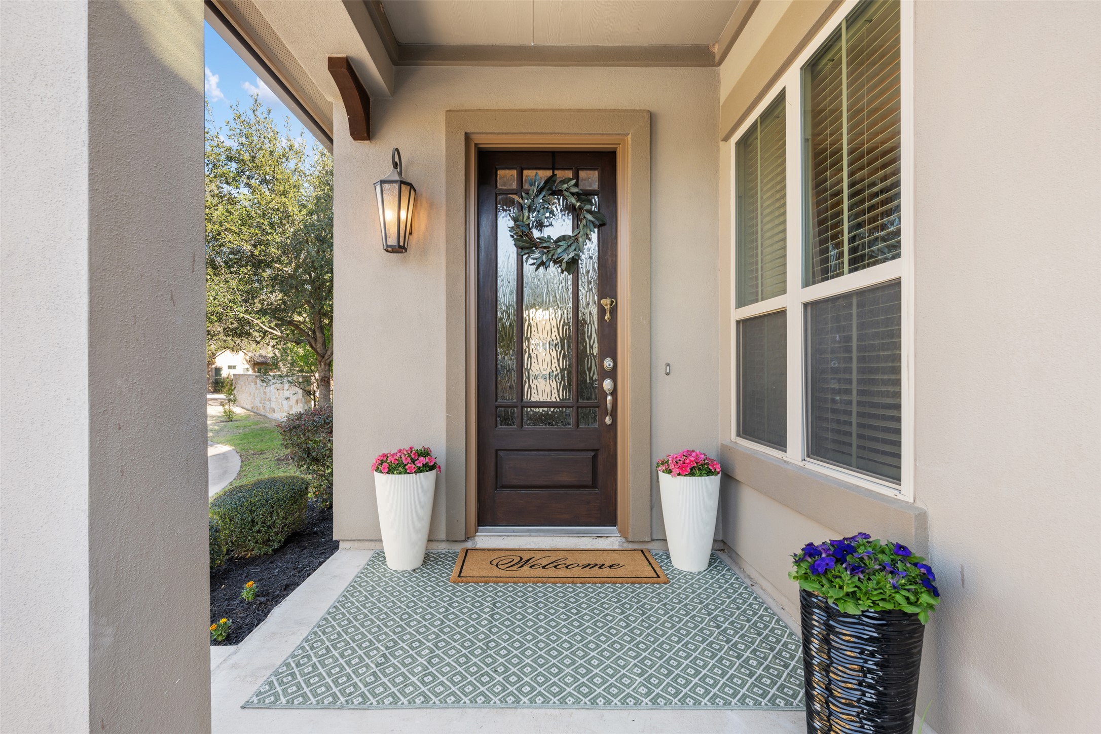 2505 Hopsack Mills Road Austin, TX 78748 - Photo 2 of 40 Perfect low maintenance property with HOA fees covering landscaping, exterior maintenance & insurance, common area maintenance & amenities including beautiful pool & wooded greenspace with walking trails.