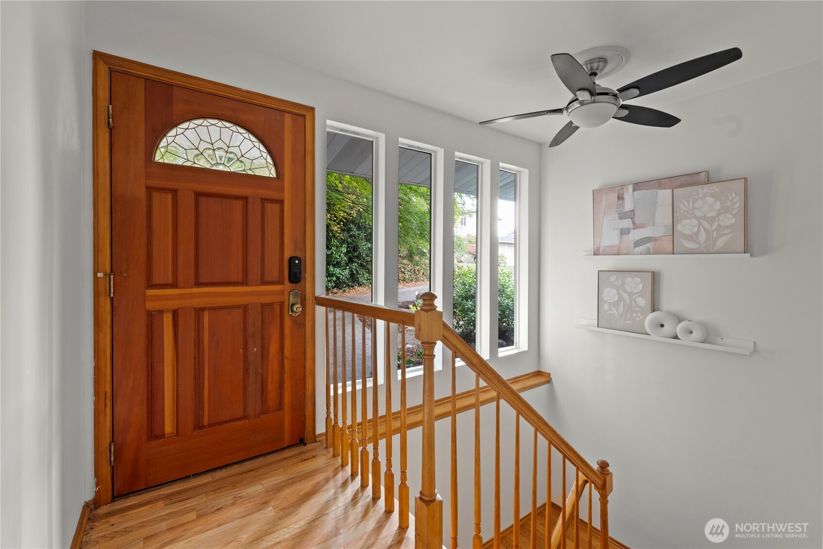 8732 209th Place Southwest Edmonds, WA 98026 - Photo 17 of 39 a view of a hallway with wooden floor and entryway
