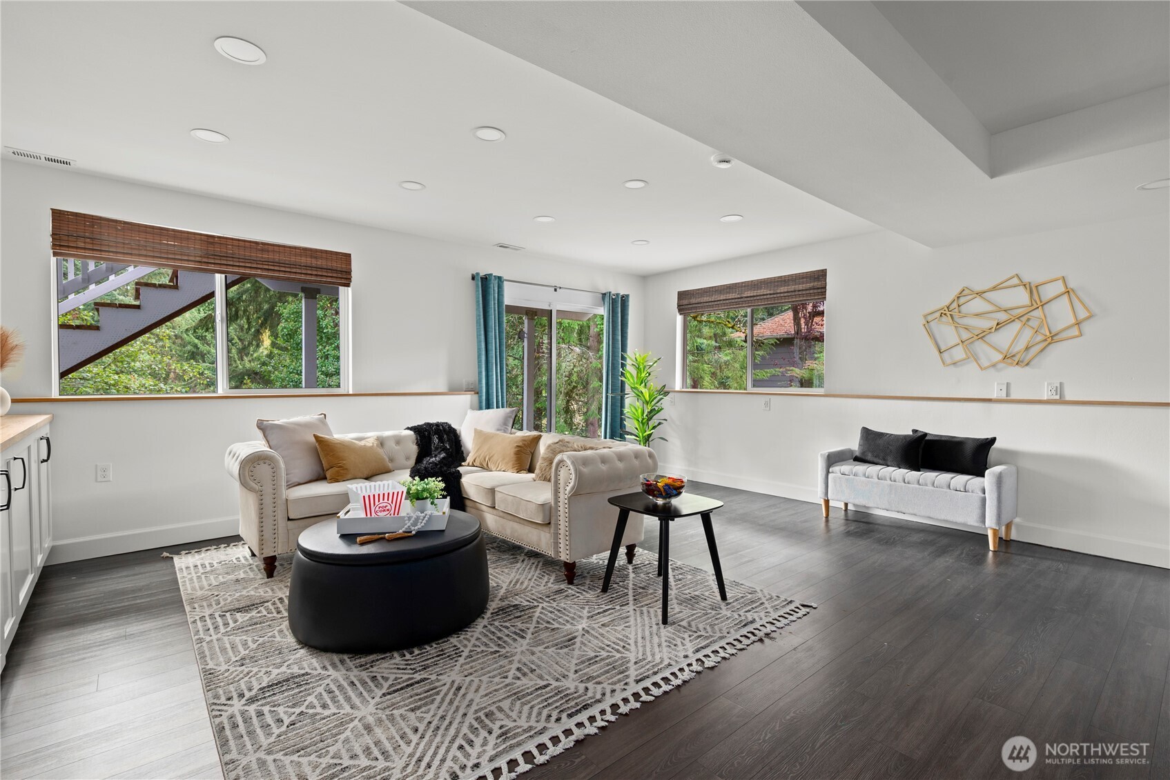 8732 209th Place Southwest Edmonds, WA 98026 - Photo 18 of 39 a living room with furniture and a large window