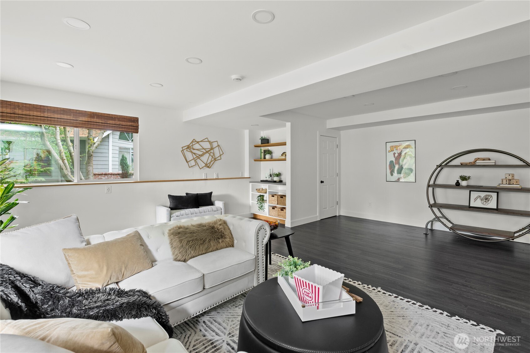 8732 209th Place Southwest Edmonds, WA 98026 - Photo 20 of 39 a living room with furniture and a wooden floor