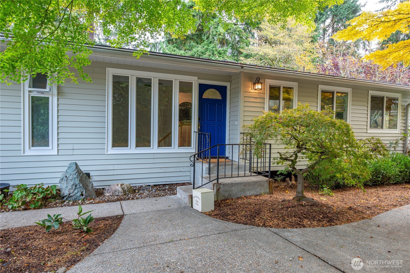 8732 209th Place Southwest Edmonds, WA 98026 - Photo 2 of 39 a front view of a house with garden