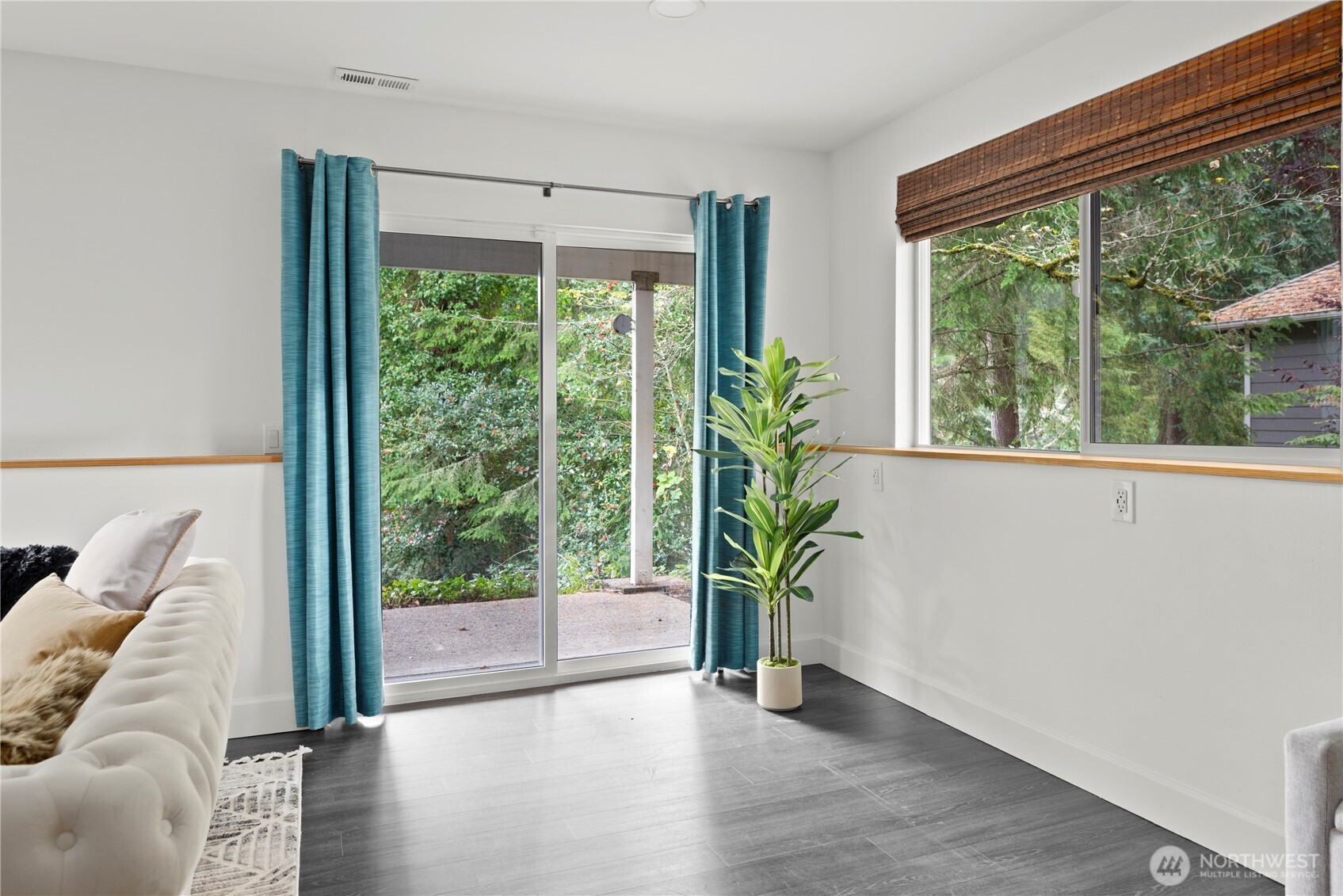 8732 209th Place Southwest Edmonds, WA 98026 - Photo 22 of 39 an empty room with wooden floor and windows