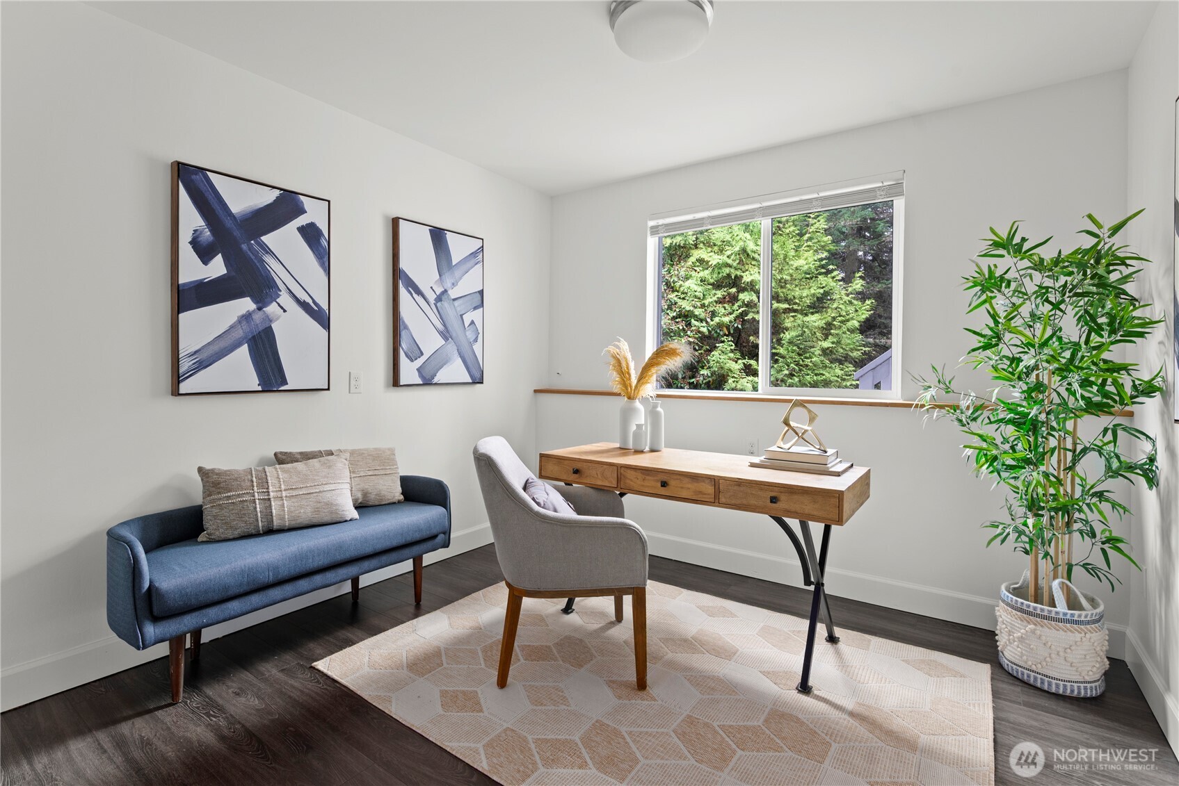 8732 209th Place Southwest Edmonds, WA 98026 - Photo 23 of 39 a living room with furniture and a potted plant