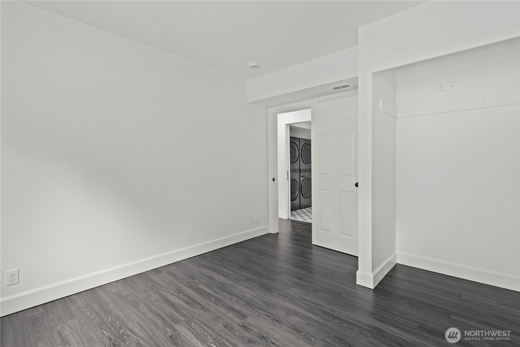 8732 209th Place Southwest Edmonds, WA 98026 - Photo 27 of 39 a view of an empty room with wooden floor