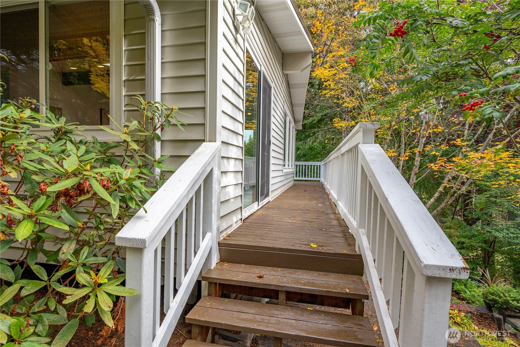 8732 209th Place Southwest Edmonds, WA 98026 - Photo 31 of 39 a view of balcony with wooden floor and fence