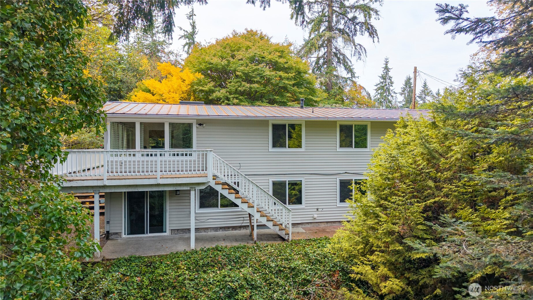 8732 209th Place Southwest Edmonds, WA 98026 - Photo 36 of 39 a front view of a house with a garden
