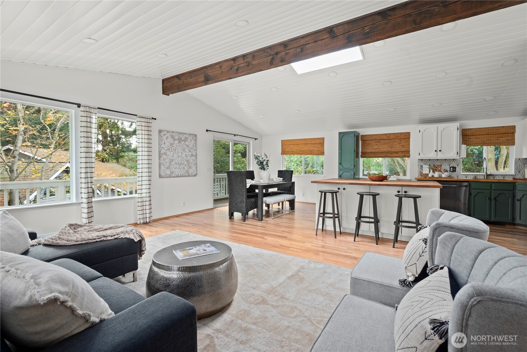 8732 209th Place Southwest Edmonds, WA 98026 - Photo 7 of 39 a living room with furniture and a large window