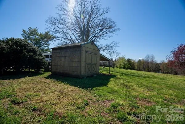a view of backyard with green space