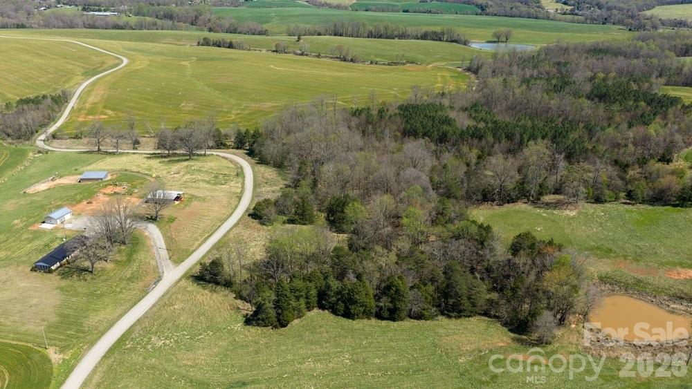 889 Tabor Road Olin, NC 28660 - Photo 30 of 34 a view of an outdoor space and a lake view