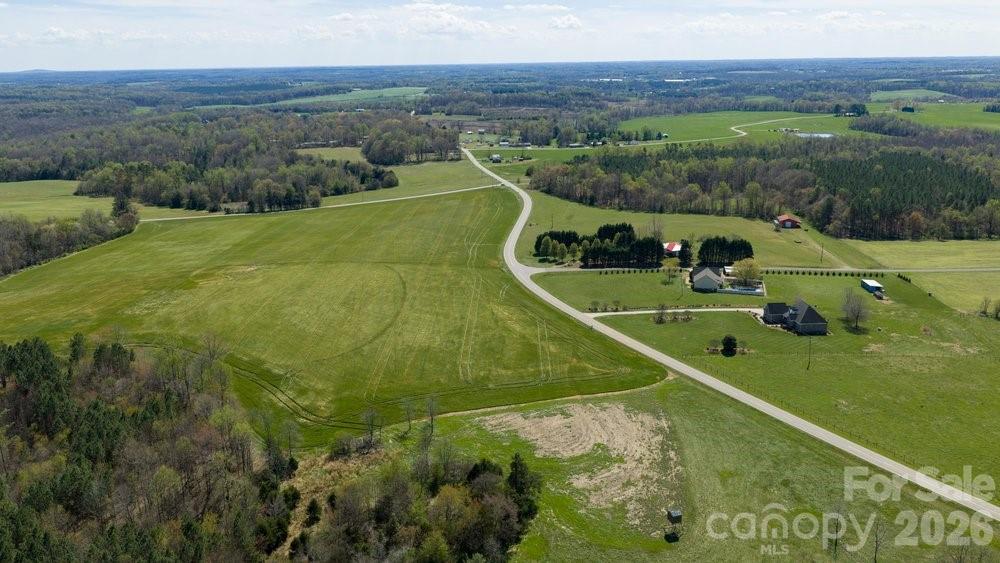 889 Tabor Road Olin, NC 28660 - Photo 33 of 34 a view of a tennis court