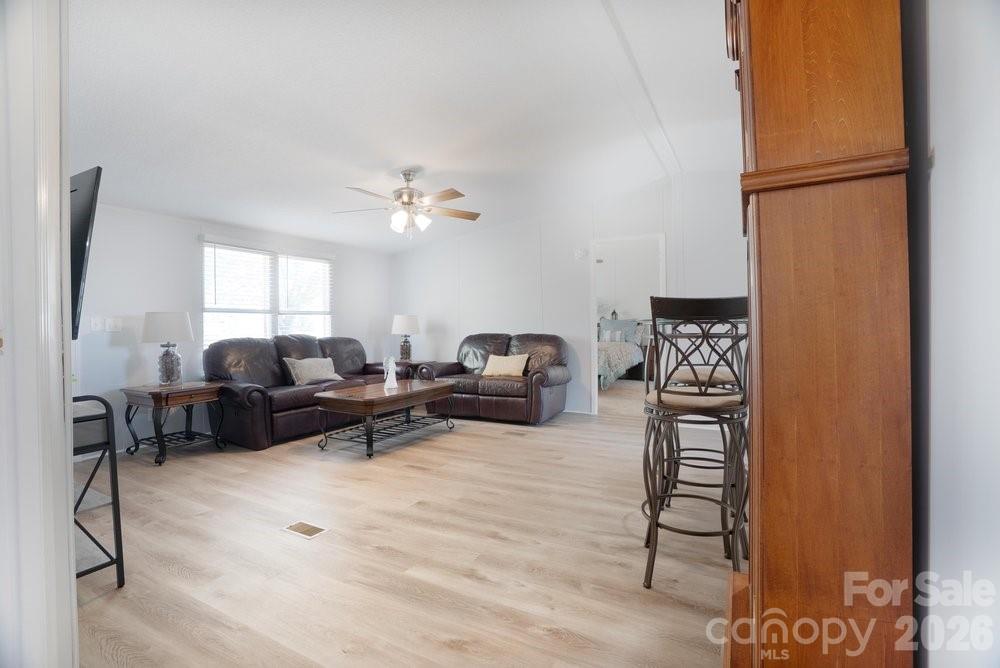 889 Tabor Road Olin, NC 28660 - Photo 6 of 34 a living room with furniture and a window