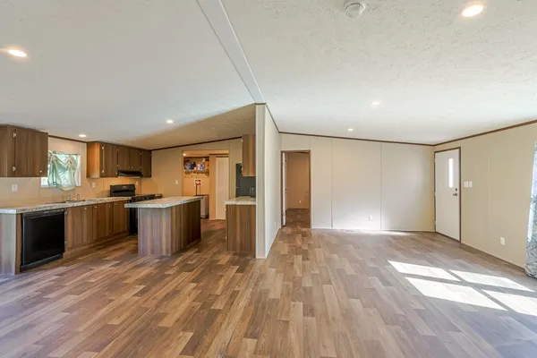 a view of kitchen with wooden floor