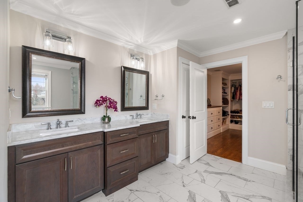 56 Blossomcrest Road Lexington, MA 02421 - Photo 16 of 29 a bathroom with a sink vanity and mirror