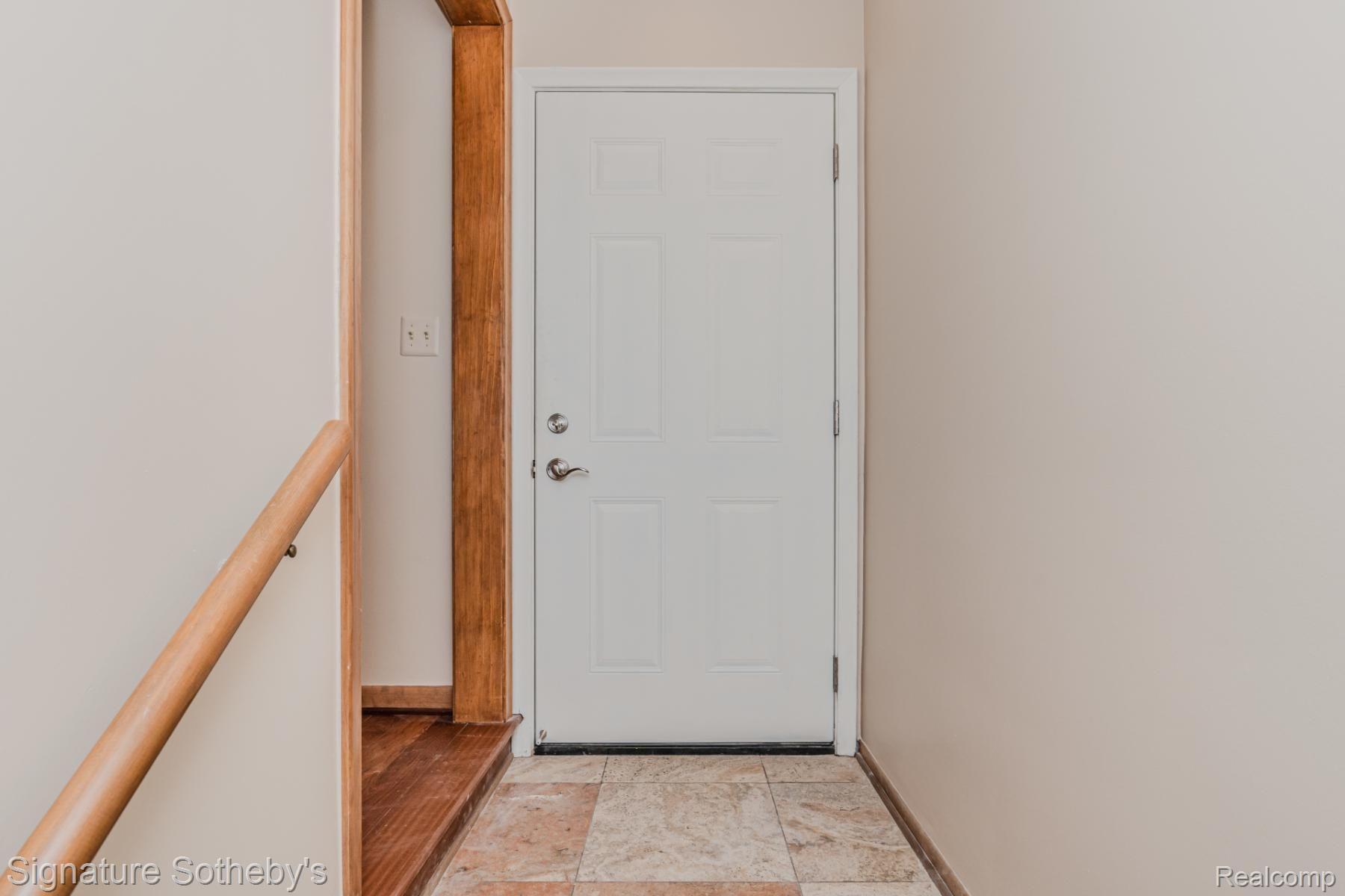 11416 East 13 Mile Road Warren, MI 48093 - Photo 20 of 94 Hallway to garage & 1st laundry room