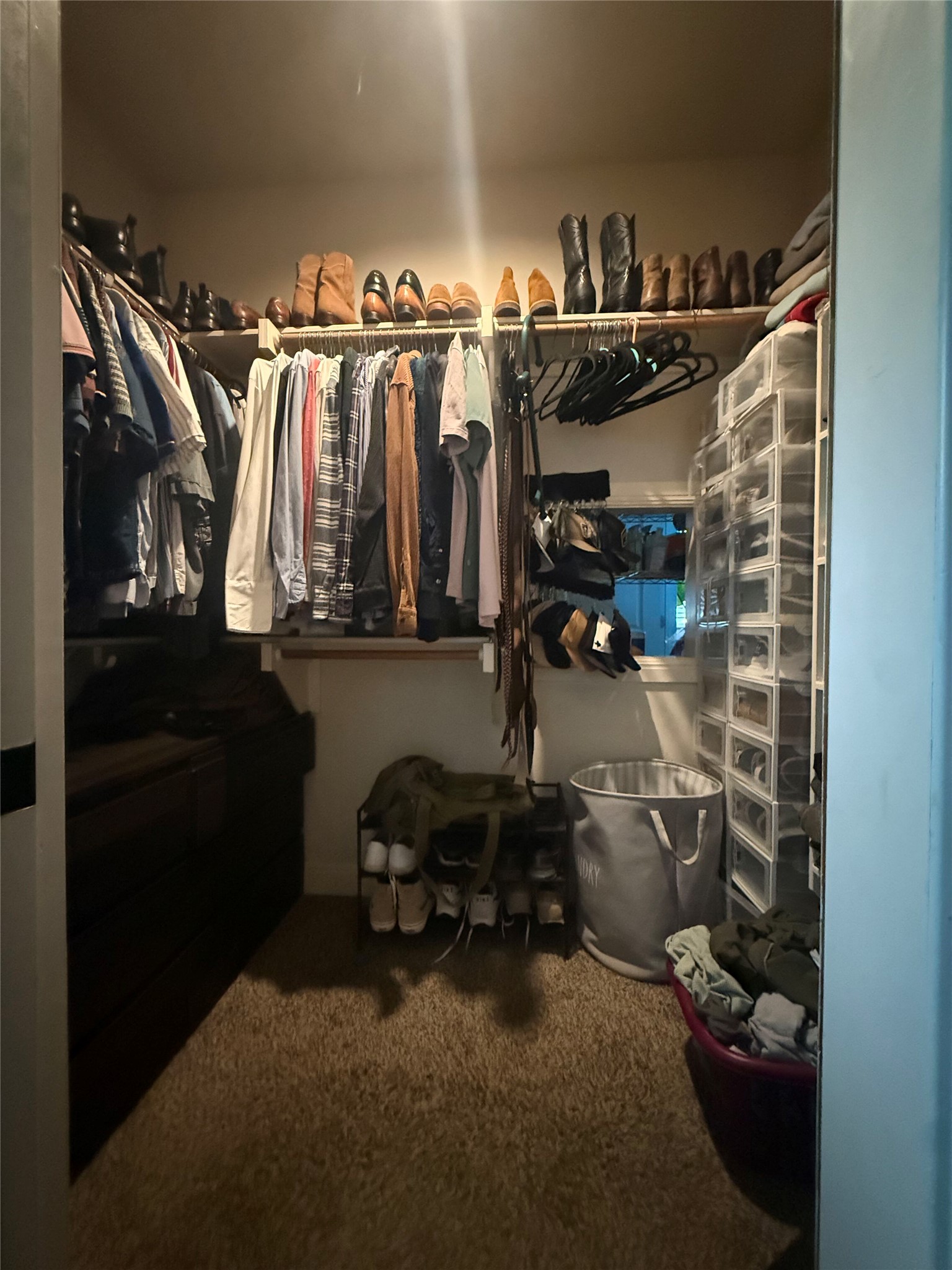 408 West Croslin Street Austin, TX 78752 - Photo 12 of 29 Ample hanging space and shelving ensure an organized and accessible wardrobe.