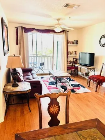a kitchen with stainless steel appliances a stove a sink and a refrigerator