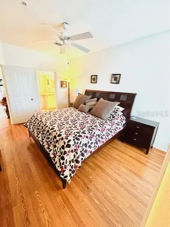 a bathroom with a sink mirror vanity and toilet