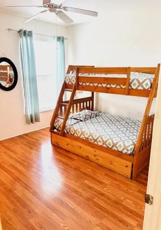 a view of swimming pool with outdoor seating